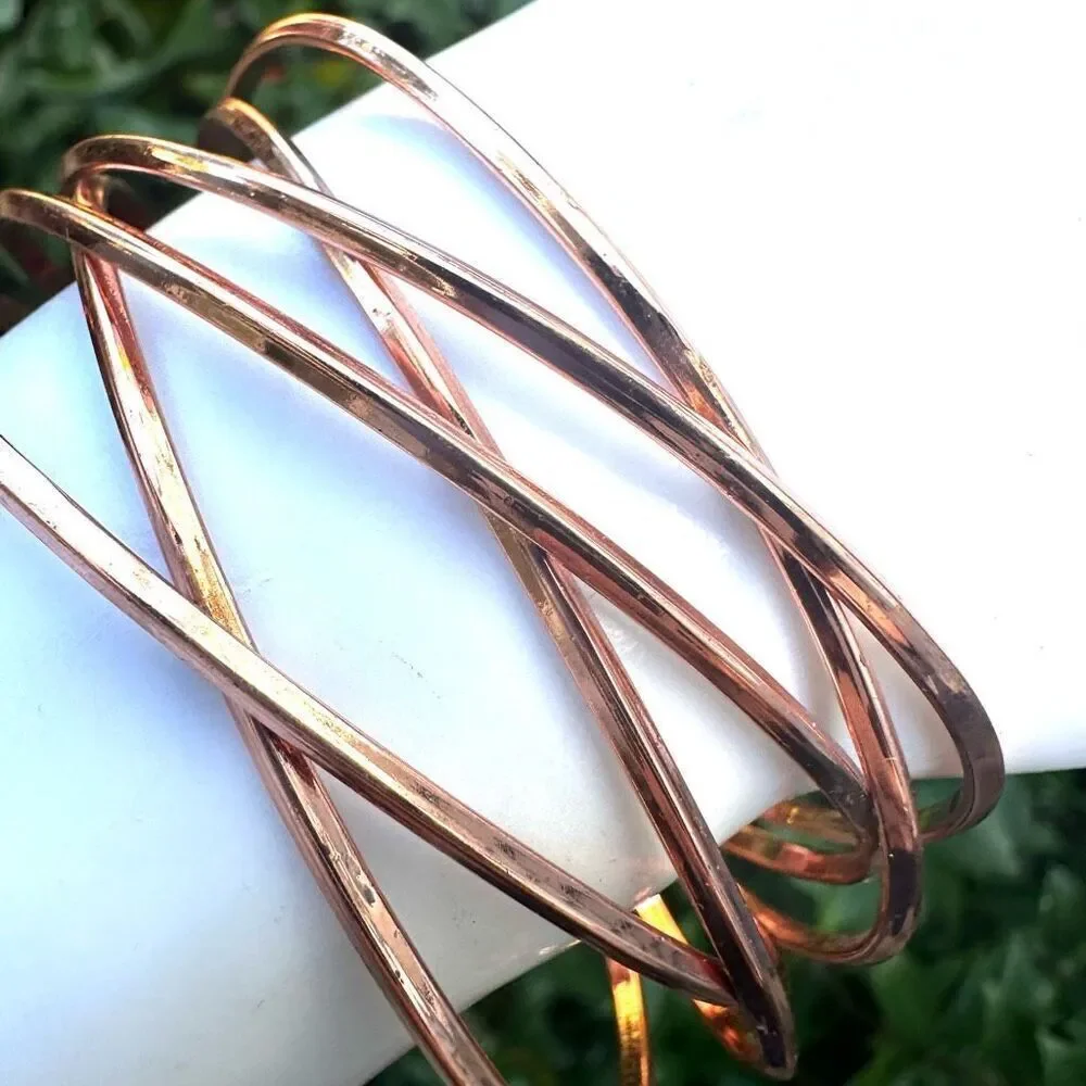 Rose gold tone twisted open cuff bracelet